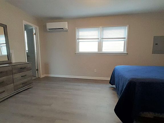 Spacious Bedroom with New Furniture