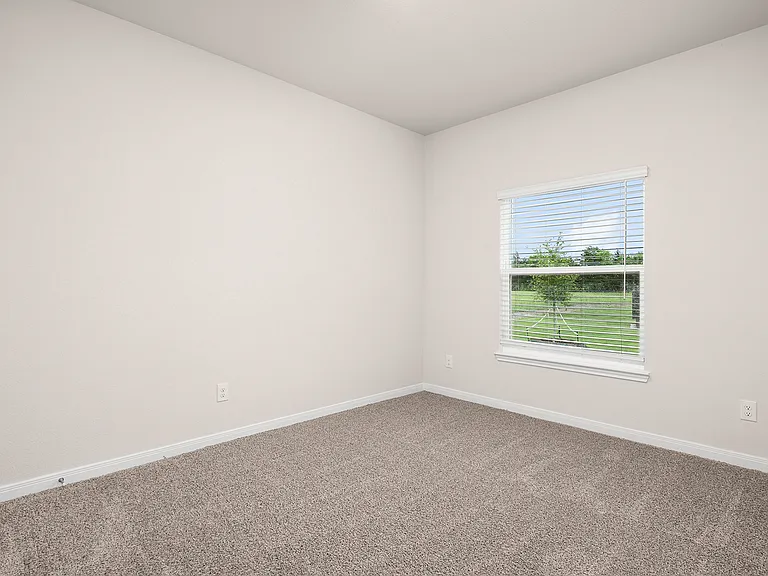 The secondary bedrooms are a great space for a children's bedroom, guest room, or home office.