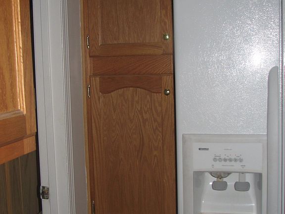 Smaller pantry next to refrigerator 2007