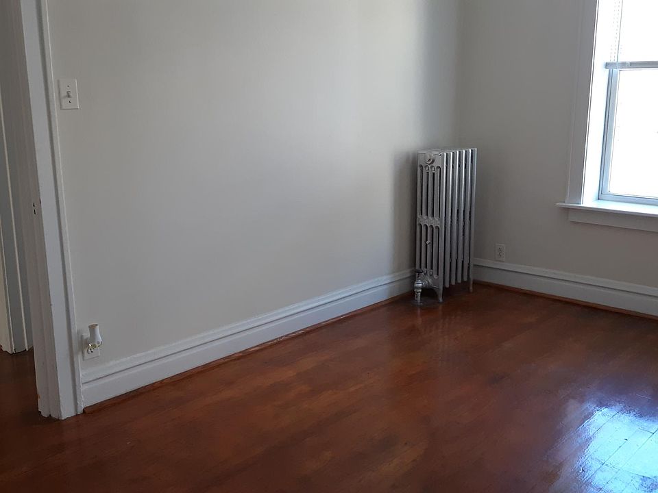 Beautiful floor in large, bright bedroom.