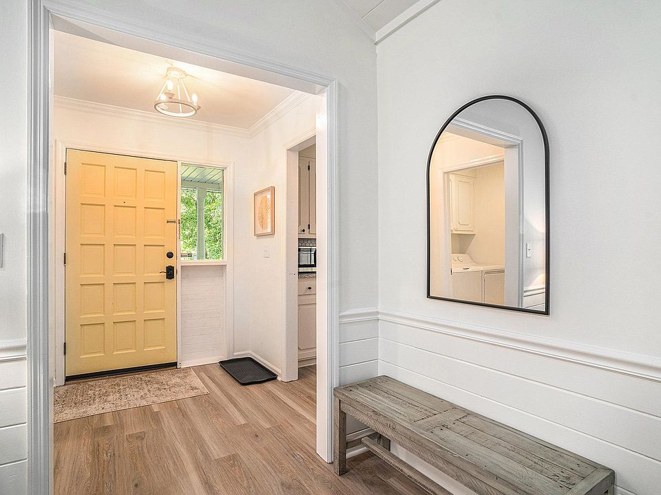Living area/entrance to arcade room
