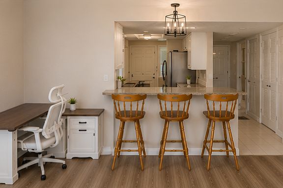 Enjoy drinks at the bar or take care of business at the new sit/stand desk