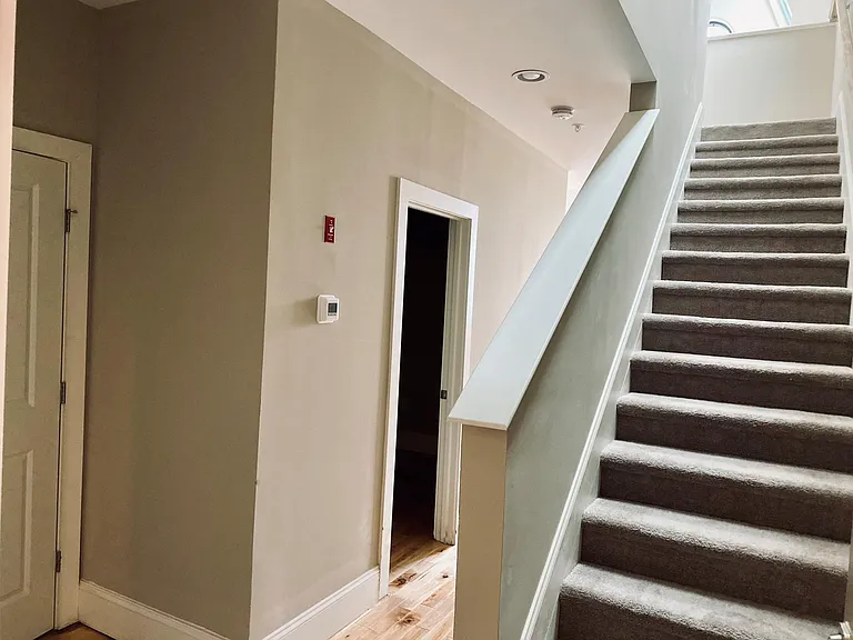 Lofted Den Stairs at Entrance