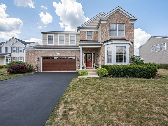 Fieldstone front exterior and low-maintenance landscaping