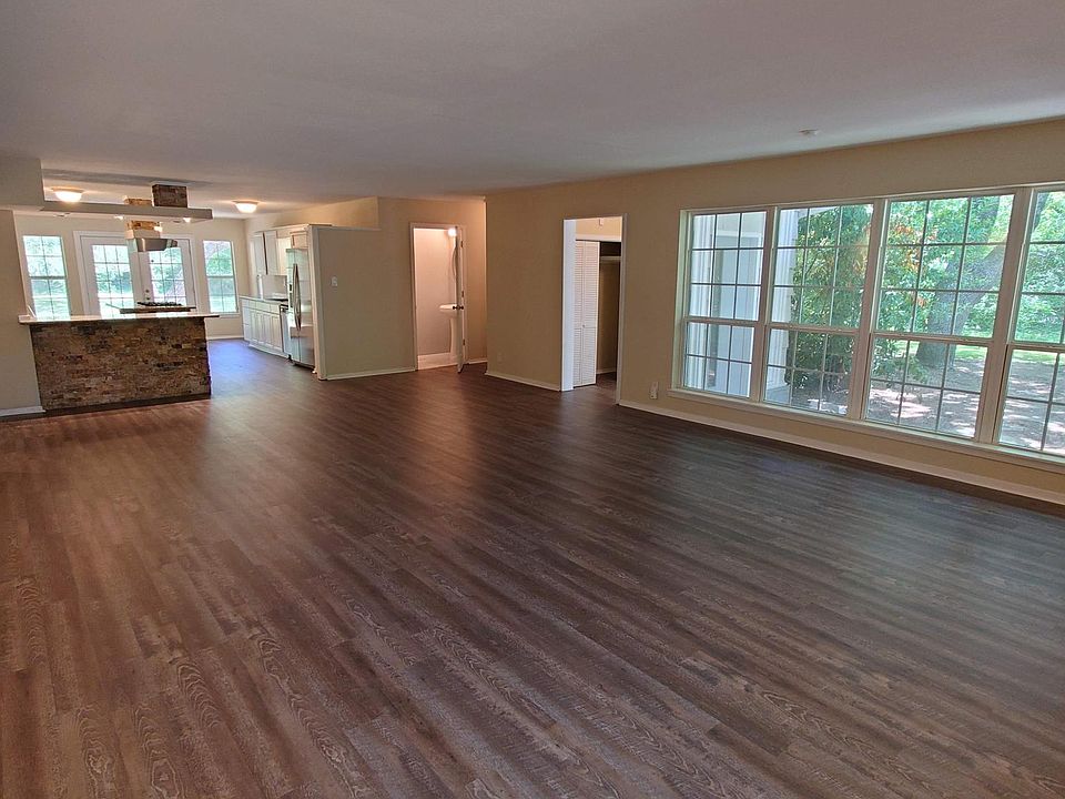 Living, Kitchen and Entry with View to Courtyard