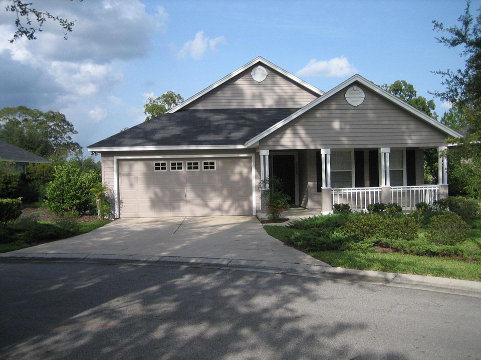 Front door (facing west) with a porch.