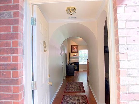 Dramatic Entry with dining to the right and office to the left.