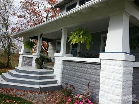 New front entry steps, freshly painted porch!