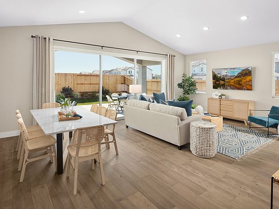 Dining area with low profile lighting great room with gorgeous floors