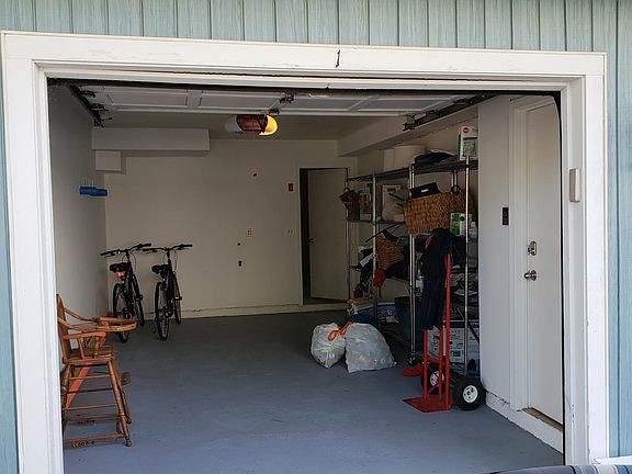 GARAGE FOR 1 CAR METAL SHELVING UNITS FOR STORAGE. THE FAR D