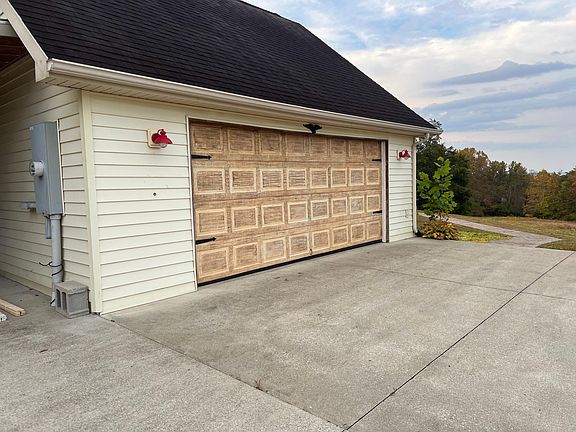 Tenant parking outside garage