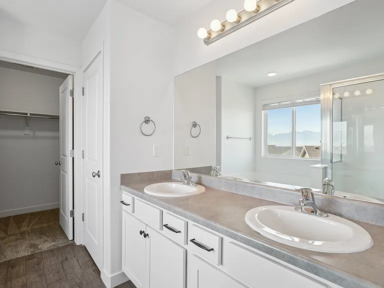 Master Bath : Double Vanity sink, toilet closet and walk-in closet