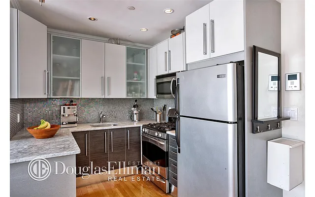 Sold by Douglas Elliman | media 9