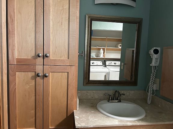 Bathroom with shower, and storage
