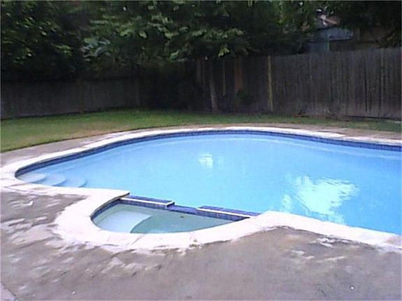Backyard and in ground swimming pool