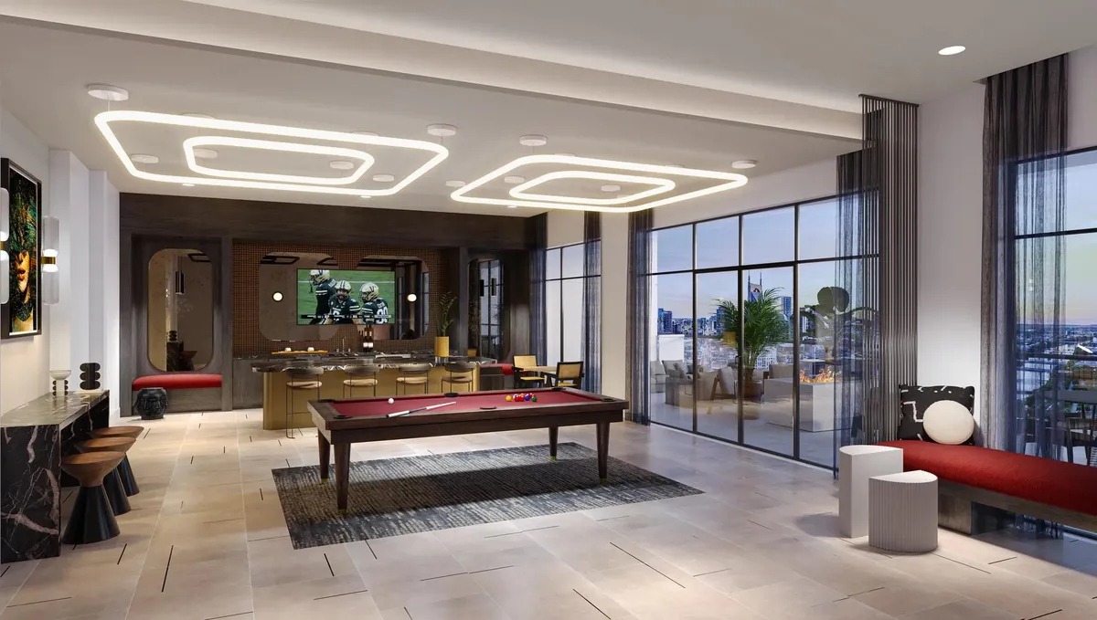 Rooftop lounge with demonstration kitchen, outdoor terrace with firepit, and sweeping views of Downtown Nashville. - Modera SoBro
