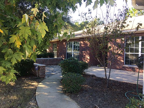 Patio and front door view from driveway