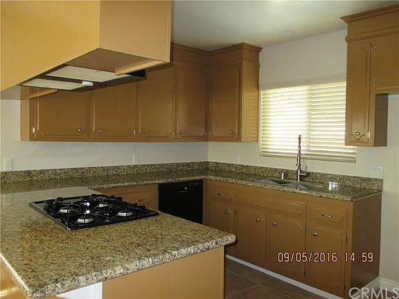 Remodeled kitchen with granite countertop