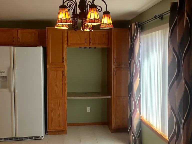 Built in desk with additional storage cabinets