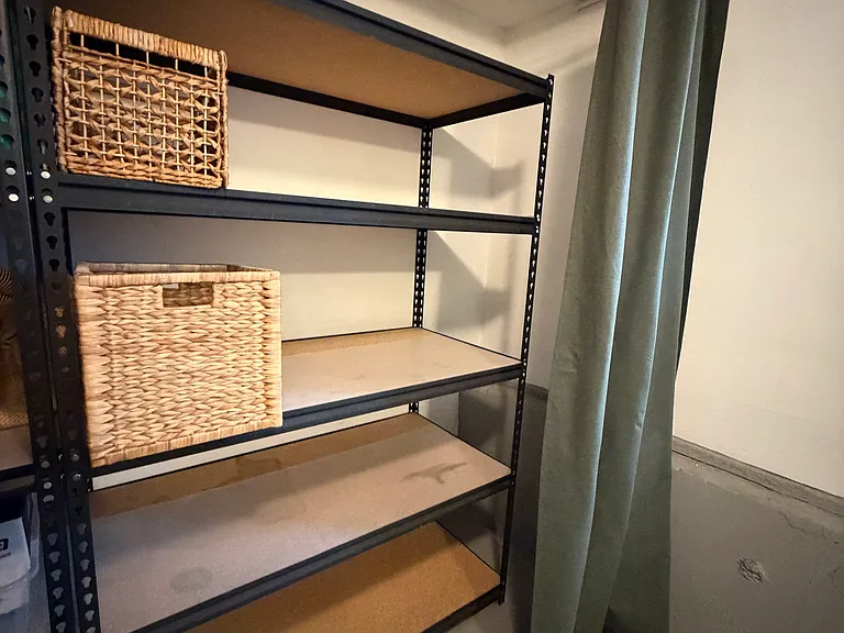Private storage included with the unit in the shared laundry area with secure keypad entry.