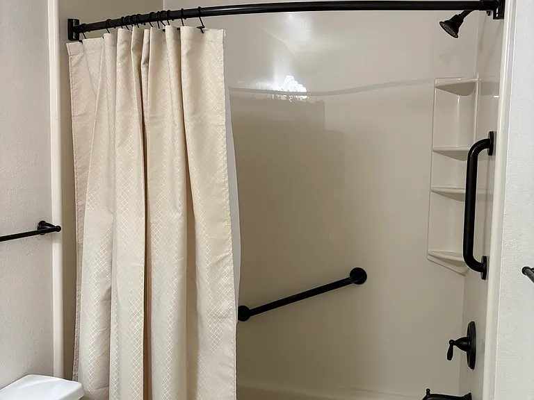 Shower with grab bars