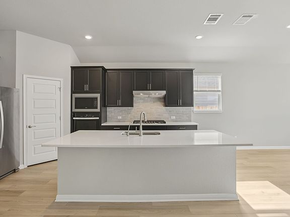 Cook a delicious meal in this beautiful kitchen.