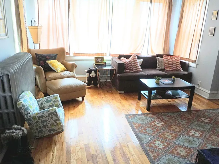 living room with large windows letting in wonderful light.