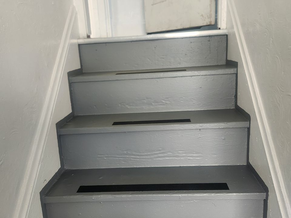 Entry freshly painted hallway and stairs