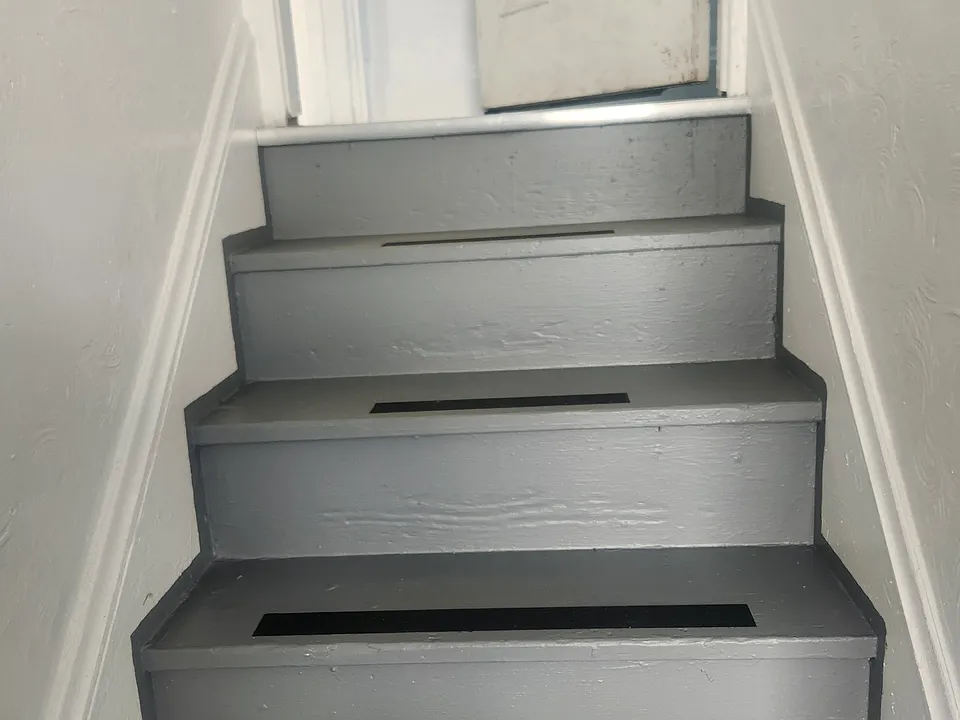 Entry freshly painted hallway and stairs