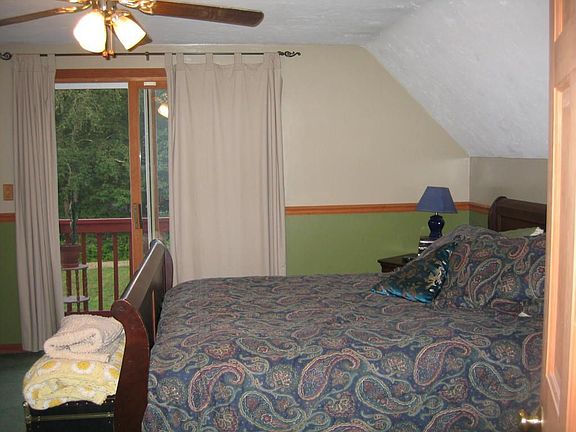 Master bedroom w/sliders to balcony