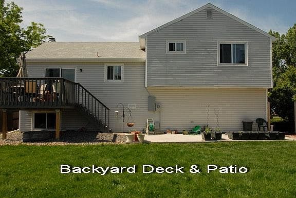 Beautiful backyard with both a deck and a patio