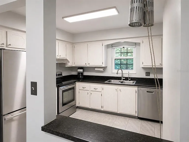 1706 Belleair Forest Dr #244 — Photo 5