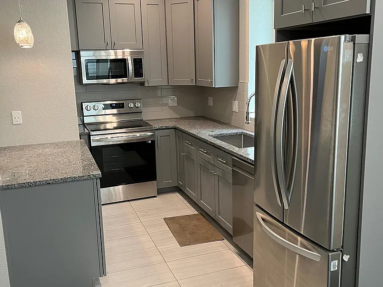 Super functional kitchen with lazy suzy, spice rack, soft close drawers and all the desired conveniences