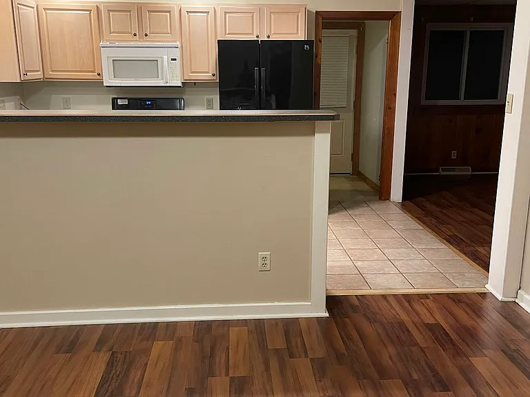 Kitchen view and Family Room to the right