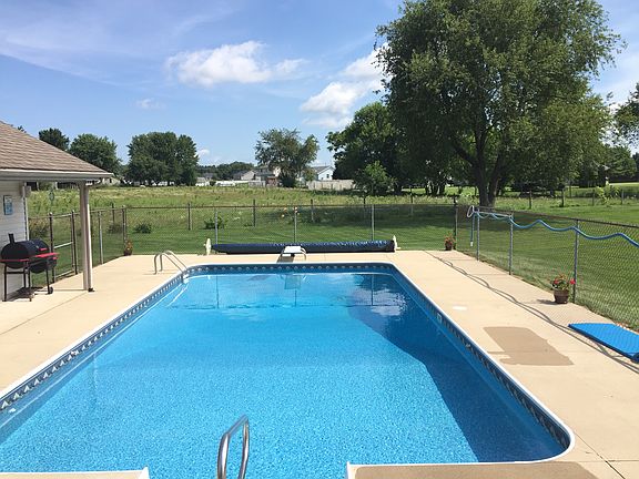 Pool view with horse field