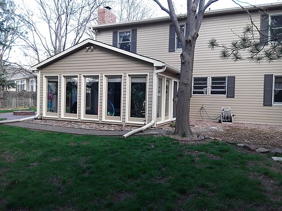 view of sunroom from backyd