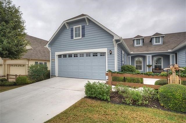 Recently repainted, outside and inside, this beautiful Sun City Texas Monterey Cottage is Lock & Lea