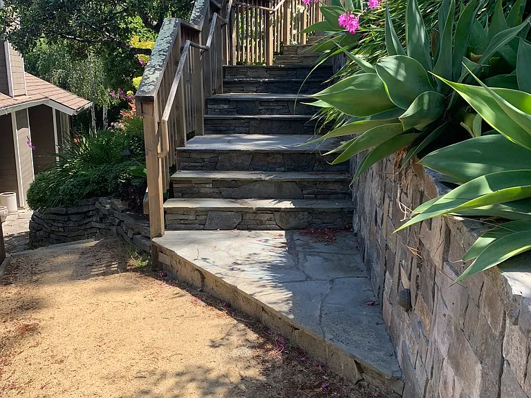 Steps to upper dining / sitting area and Cottage