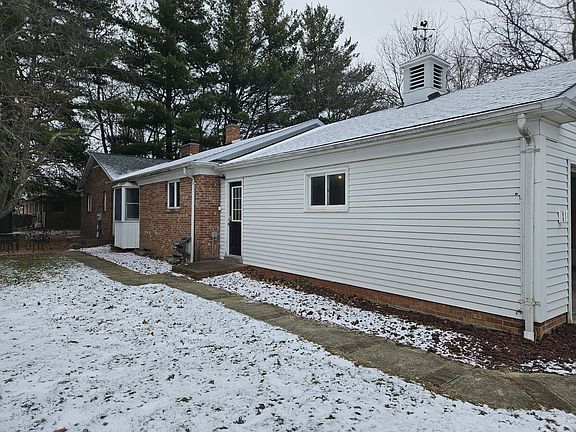 Sidewalk from garage toward patio