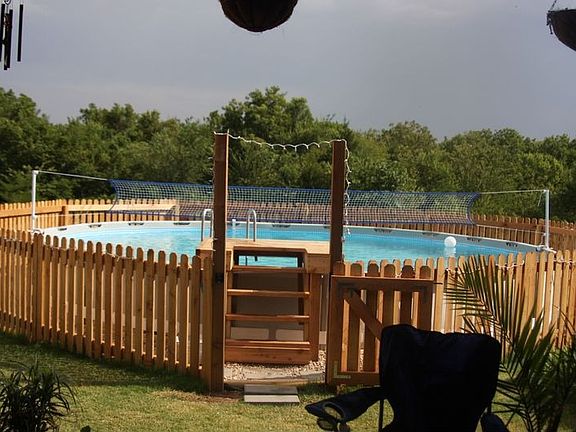 Saltwater above ground pool, completely fenced in