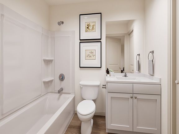 Master bathroom with a shower tub combination
