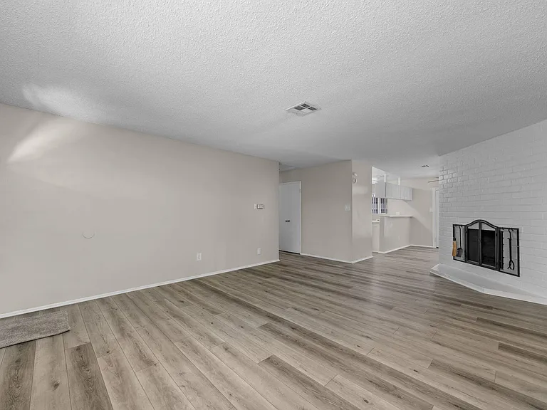 Apartment entrance and living space at Mango Tree Apartments in Santa Ana, CA
