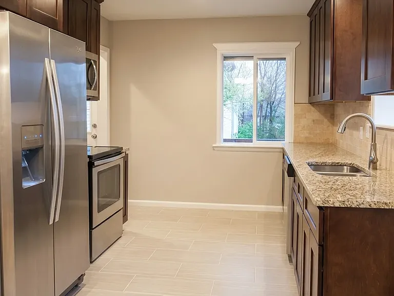 7739 Raleigh St — Photo 9