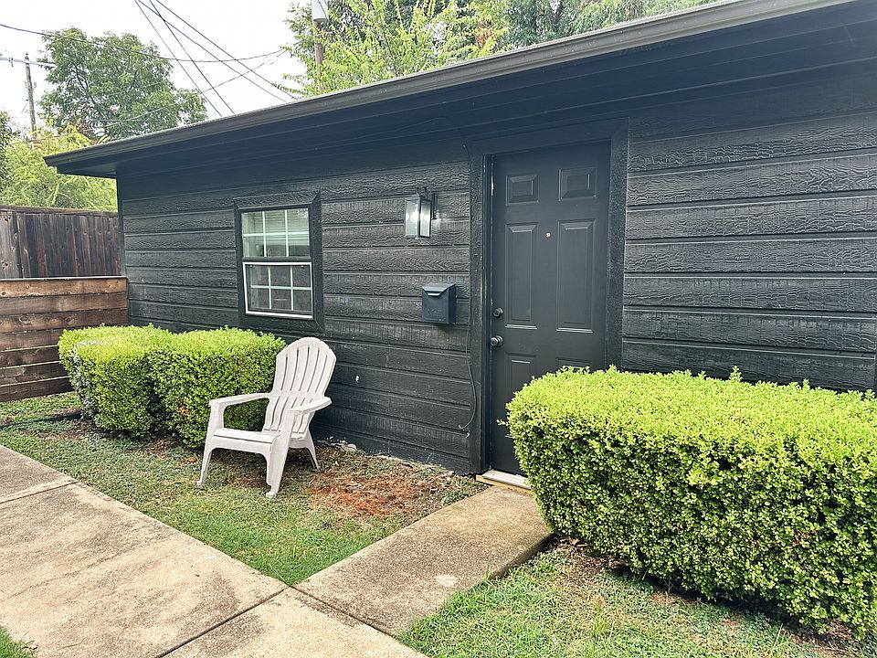 Unit entrance is inside a locked fence.