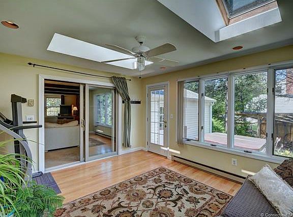 Heated sunroom has ceiling ...