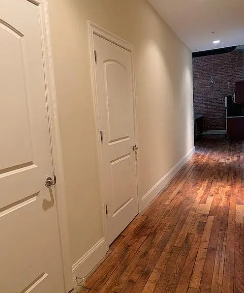 Hallway with 2 Deep Closets