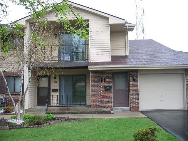 Upper 2 bedroom 2 full bath condo with attached garage