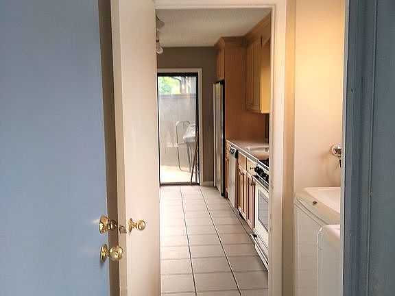 Laundry Area with cabinets