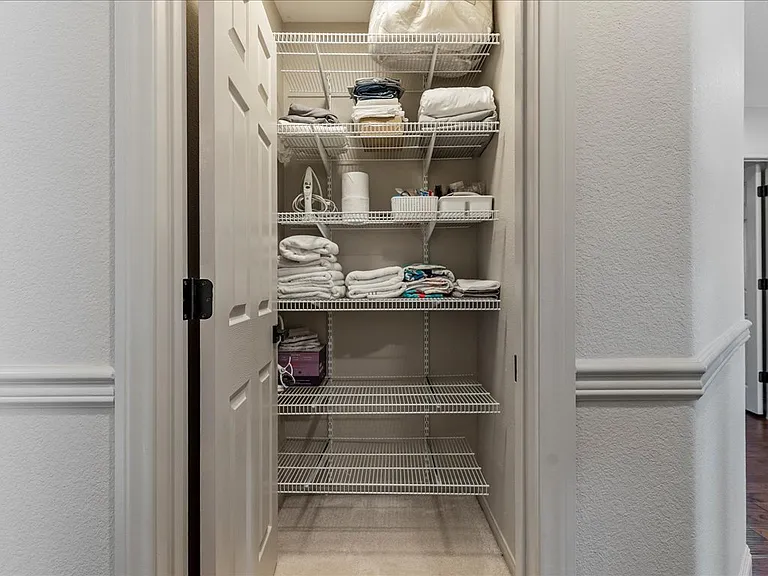Linen closet stocked with essentials