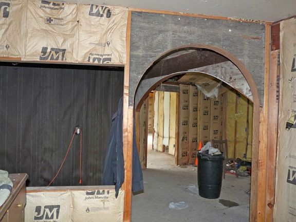 Some of the remodeling that was started included arched doorways. Lots of insulation has been added too.